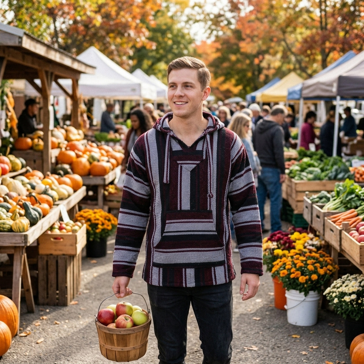 Red and grey Mexican Baja hoodie at a farmers market