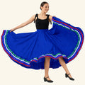 Dancer wearing the blue Mexican folklorico skirt with ribbon trim