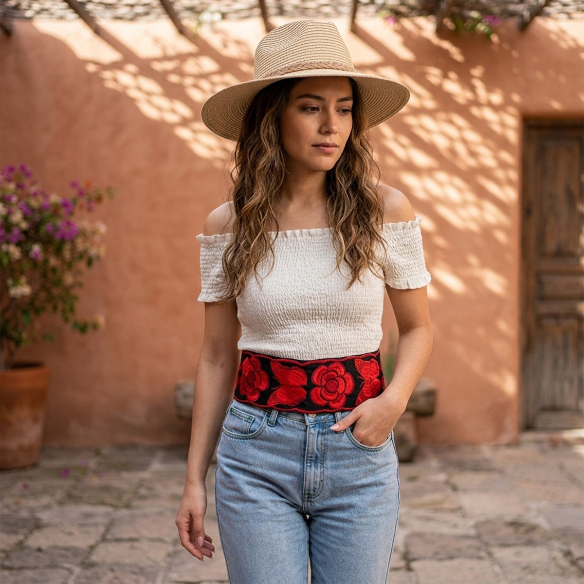 Red floral embroidered Mexican belt styled with a straw hat and white top